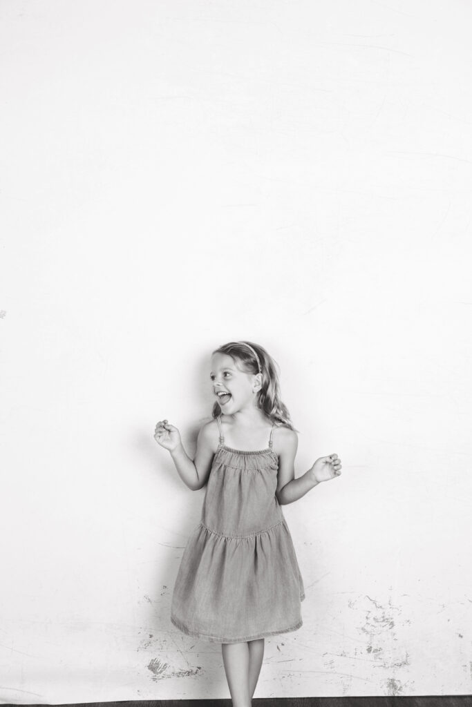 Indoor family photographer Pittsburgh creating relaxed studio family portraits in Murrysville PA